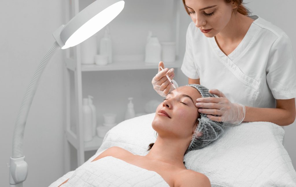 Beautician doing filler injection